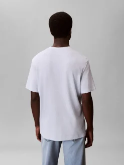 Calvin Klein Jeans miesten t-paita SS Waffle Badge Crewnk Tee, vaaleansininen