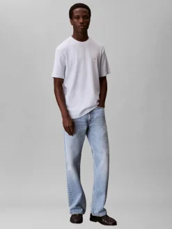 Calvin Klein Jeans miesten t-paita SS Waffle Badge Crewnk Tee, vaaleansininen