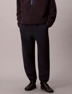 Calvin Klein Jeans miesten collegehousut Cotton Spacer Jogger, tummansininen