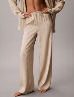 Calvin Klein naisten pyjamasetti K-SATIN AOP SET, vaalea beige