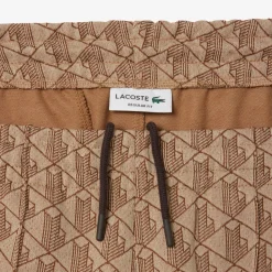 Lacoste miesten verryttelyhousut Parit Monogram Track Pant, beige