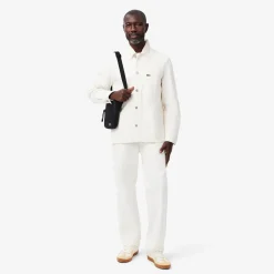 Lacoste olkalaukku, LACOSTE SMALL FLAT CROSSOVER BAG Musta